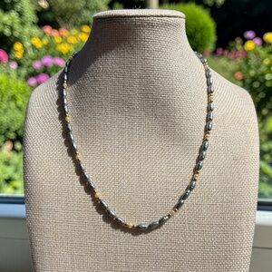Elegant Gold and Silver Beaded Necklace